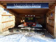 There is a snow groomer in the Halde ski area.