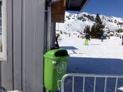 Waste containers at the lift