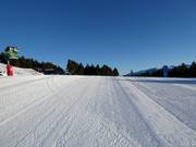 Perfectly groomed slope in the Les Angles ski area