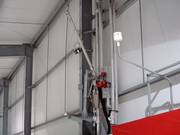 The snow guns are positioned along the slope