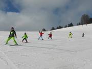 Children's ski course on the ski school slope