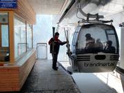 Staff hands over the skis