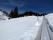 Conveyor belt and practice slope at Trübsee