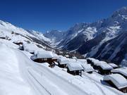 Deeply snow-covered chalets on the Lauchernalp