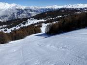 Difficult slope with a view of the Rhone Valley