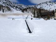 Ski school area with conveyor belt