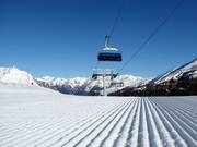 Perfectly groomed slope at the Goldseebahn