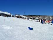 Magic carpet with practice slope in Maxiland