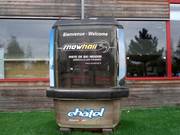 A real gondola in front of the ski hall