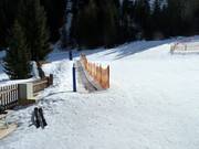 Sunkid conveyor belt at the village lift in Feichten