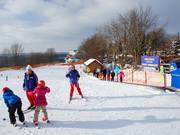 The ski school area has its own conveyor belt.