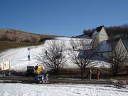 The snow-covered ski slope at Fröttmaninger Berg