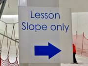 Directional signs in the ski hall