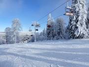 With the new four-seater chairlift to Almberg