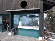 Well-maintained ticket area at the mountain station of the cable car
