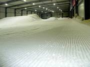 Groomed slope in the Snow Valley indoor ski hall