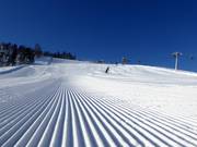 First-class slope grooming in St. Johann in Tirol