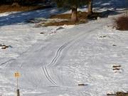 The cross-country trail starts right next to the ski slope.