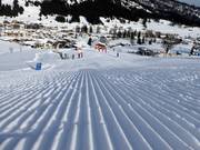 Perfect slope grooming in the Lermoos ski area