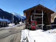 The cable car station is located right next to the train station.