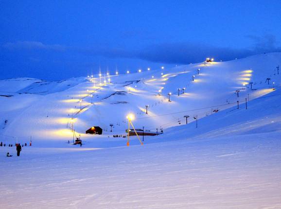 View of the Blafjöll ski resort during a night skiing session