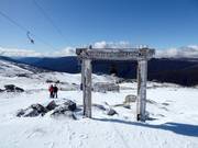 At an altitude of 2,037 m, the highest mountain station of a ski lift in Australia and Community Bell