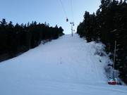 Black slope in the ski resort