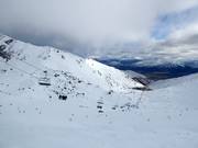 View from the summit over the ski area The Remarkables