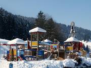 Children's playground in the snow
