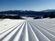 Perfectly groomed slope in the Les Angles ski area