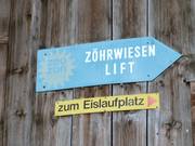 Sign to the ski lift in the village