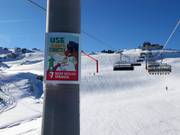 Snowpark rules as lift tower signs