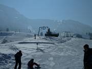 Drag lifts and wide slopes characterize the ski area