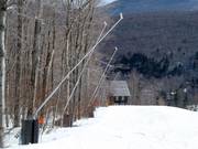 Snowmaking with lances in the practice area in the valley