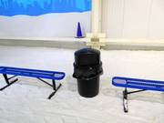 You will find waste bins in the ski hall.