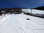 Tip for children  - Practice area at the moving carpets