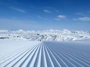 Perfectly groomed slope in the morning