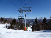 Modern 6-person chairlift in the ski resort of Sunday River