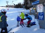 Assistance with getting on the drag lift