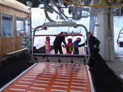 Children are always assisted when getting on.