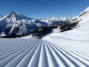 Perfect slope grooming in the Minschuns ski area