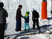 Attentive staff at the drag lifts