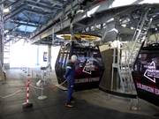 Staff is present at the gondola lift entry