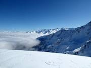 A sea of fog drifts over the Soum de Matte