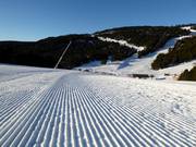 Perfectly groomed slope in the Les Angles ski area