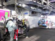 Assistance is provided when boarding the gondola lift.