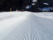 Perfectly groomed slope in the Speikboden ski area