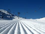 Perfect slope grooming in the Vogel ski resort