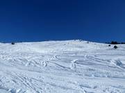 Deep-snow slope in the Minschuns ski area