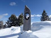 The monument at the summit of Paion is dedicated to Carlo Donei, ski instructor and founder of the Alpe Cermis Ski School.